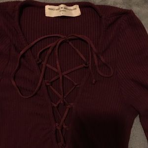 Urban Outfitters wine lace up long sleeve top
